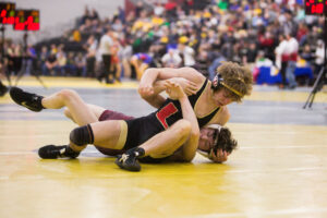 University sits 4 points back in team standings after day 1 of state wrestling tournament